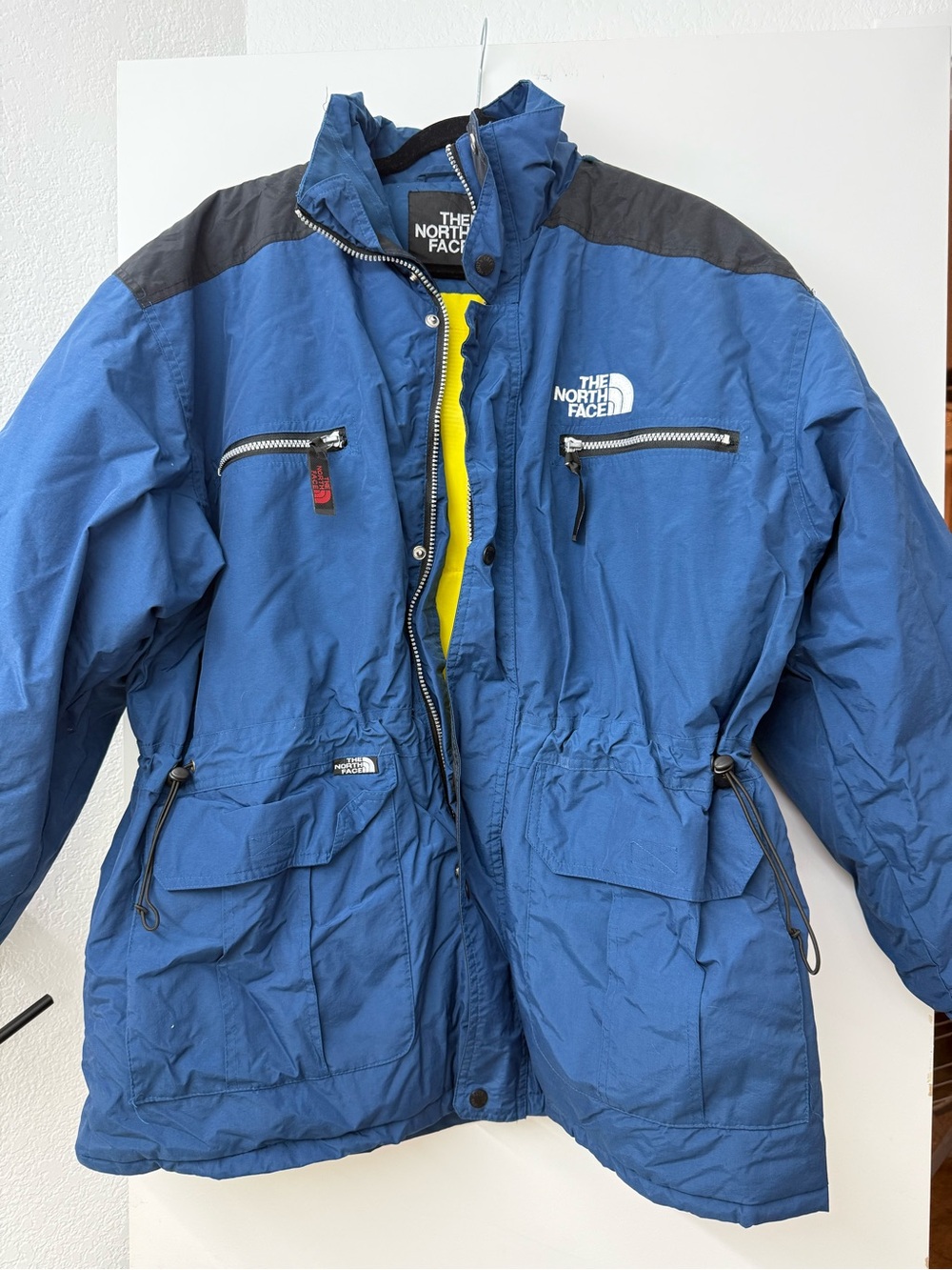 The North Face Men’s Blue Puffer Jacket with Black Shoulders